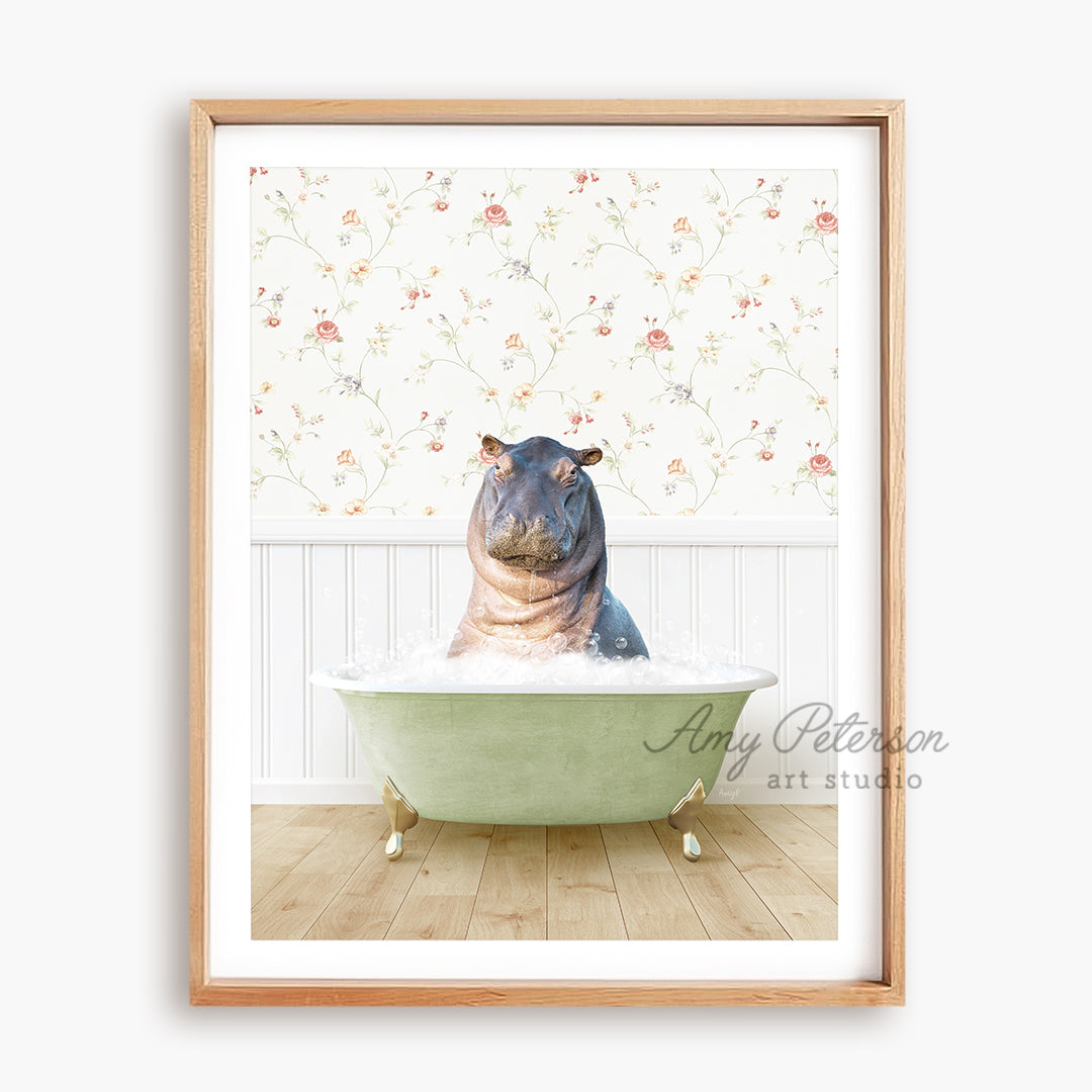 a hippo sitting in a bathtub with a flowered wallpaper behind it