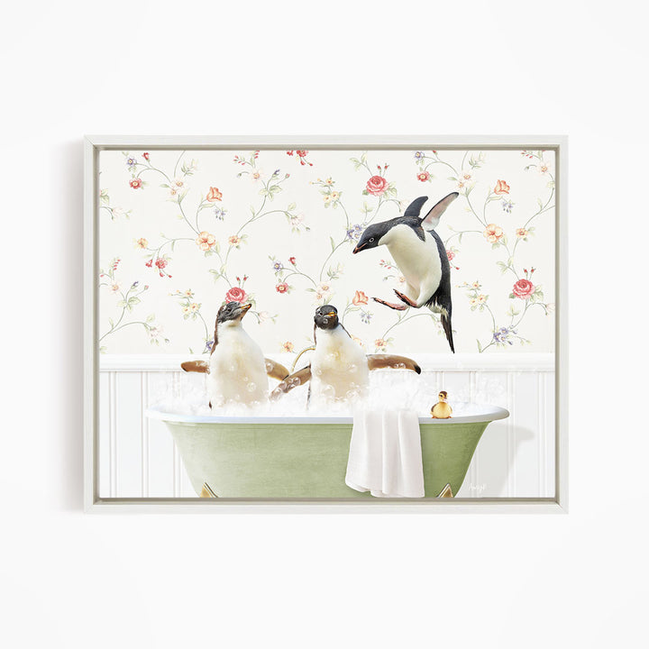 A framed image depicting three penguins sitting in a bathtub, with one penguin flying towards the others.