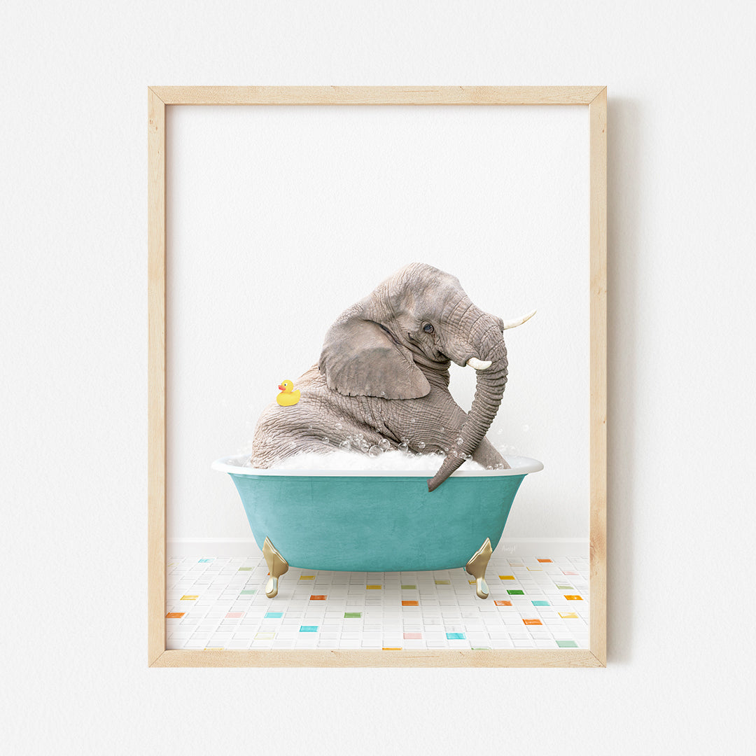 a baby elephant sitting in a blue bath tub