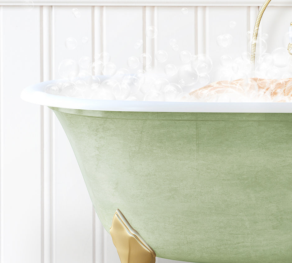 a bathtub filled with bubbles and a gold faucet