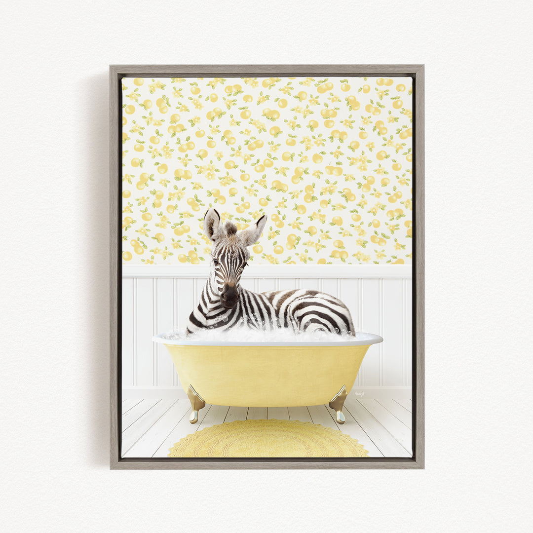A zebra is sitting in a yellow bathtub, surrounded by a yellow and white floral pattern on the wall behind it.