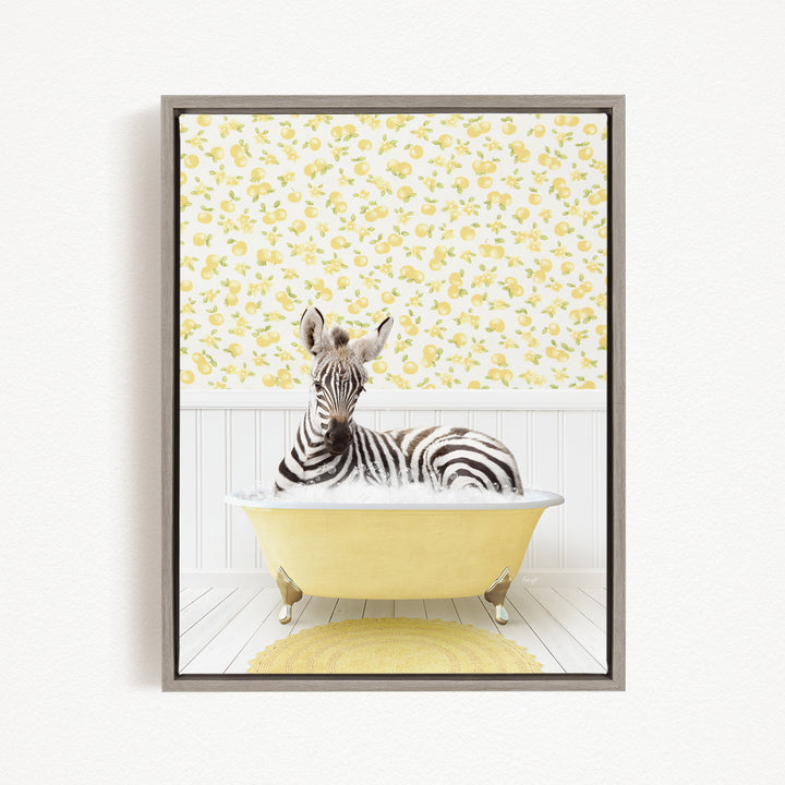 A zebra is sitting in a yellow bathtub, surrounded by a yellow and white floral pattern on the wall behind it.