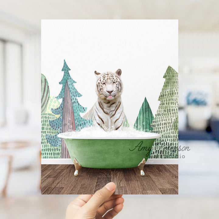 a white tiger sitting in a green bath tub