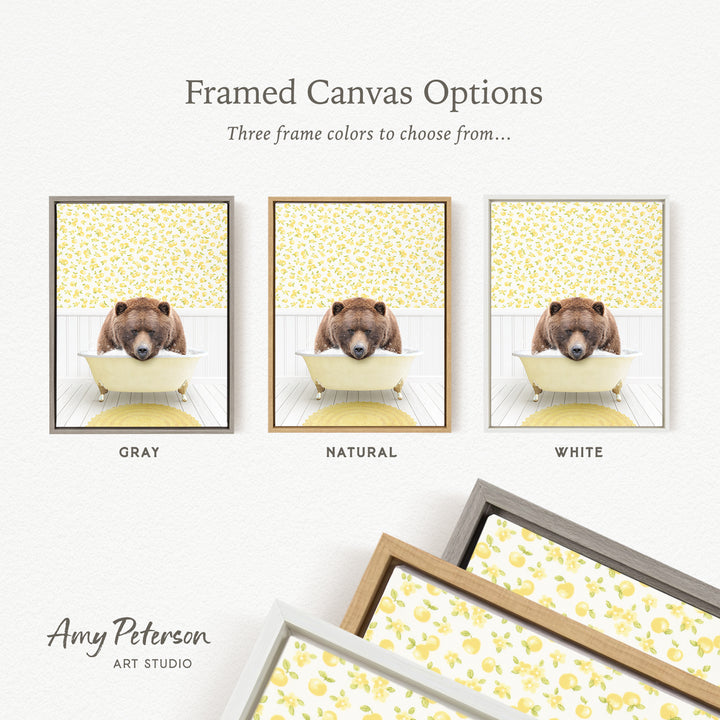 The image is a framed canvas option featuring three different framed pictures of a bear sitting in a bathtub, each with a different frame color: gray, natural, and white.