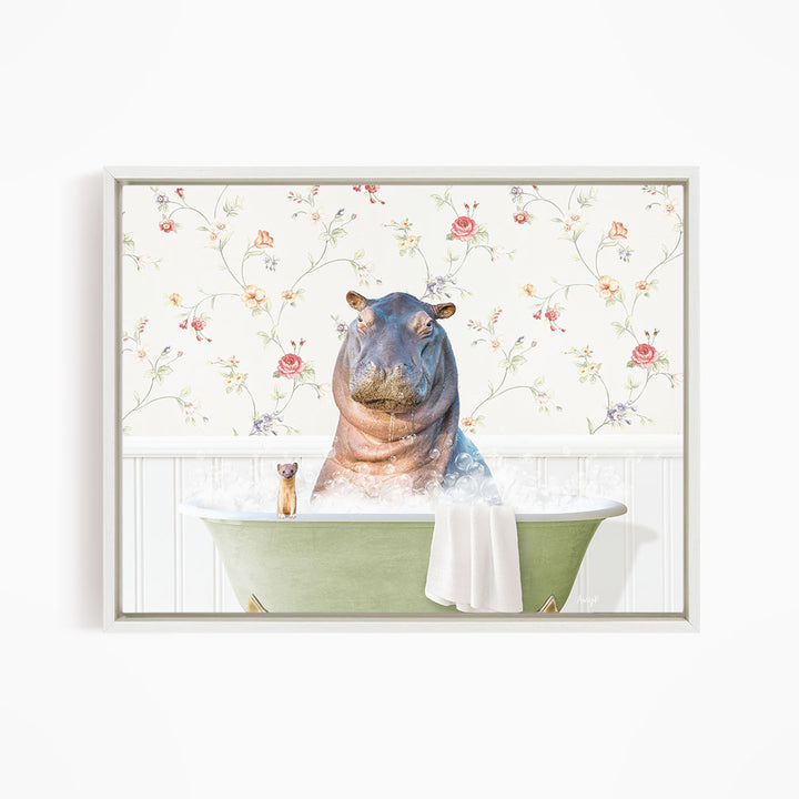 A hippopotamus sitting in a green bathtub, surrounded by a floral wallpaper, with a small cat sitting on the edge of the tub.