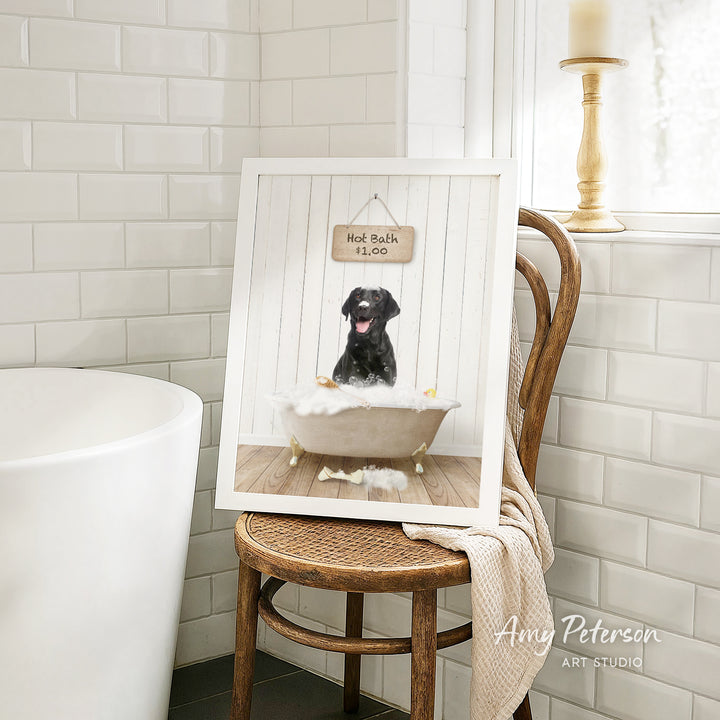 A framed image of a black dog sitting in a bathtub, with a sign above it that says "Not Bath 1.00". The image is displayed on a wooden chair in a bathroom setting.