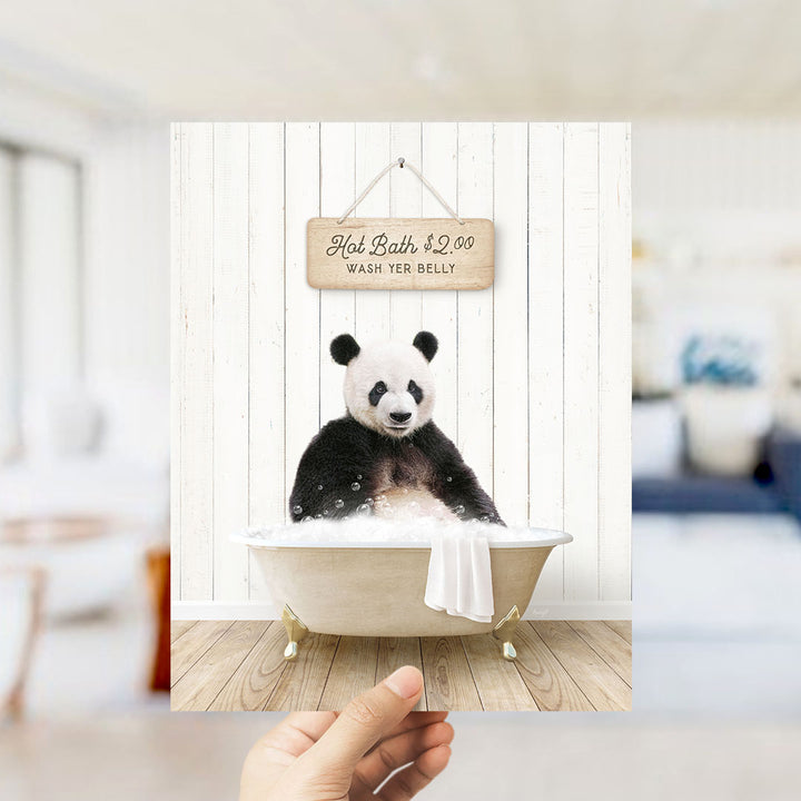 A panda bear sitting in a bathtub, with a sign above it that says "Hot Bath $2.00 WASH YOUR Belly".
