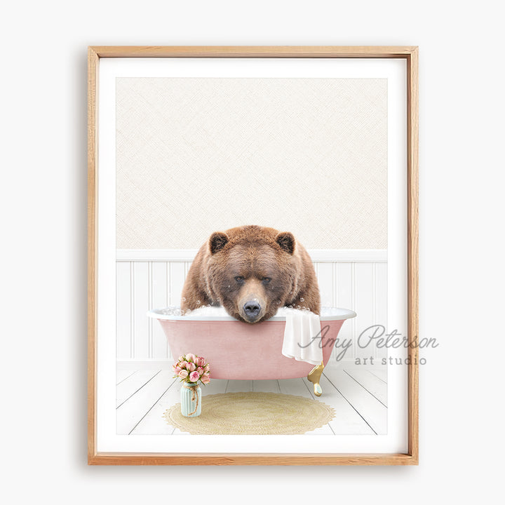 a picture of a bear taking a bath in a bathtub