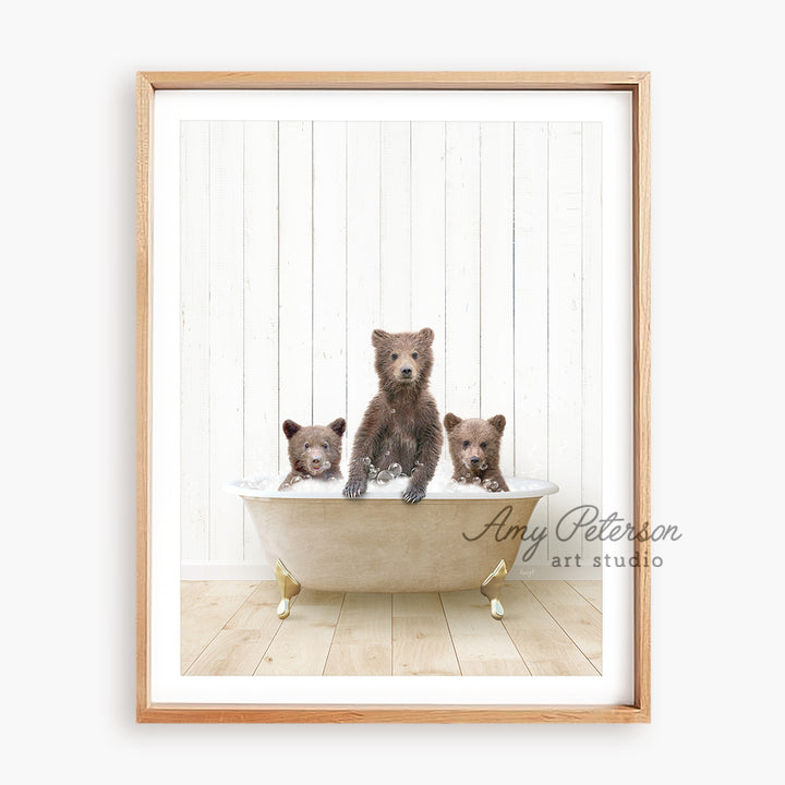 a picture of three bears in a bathtub