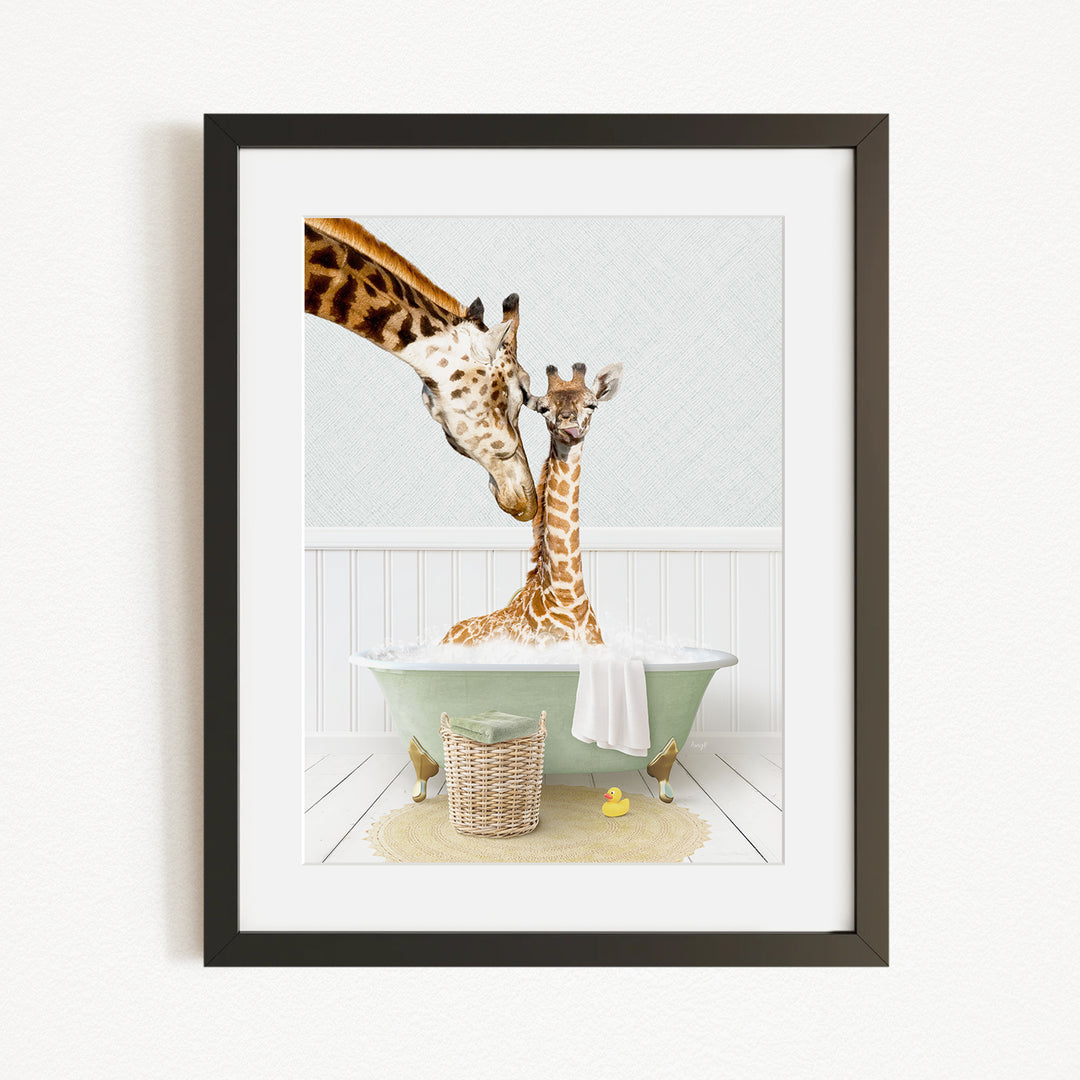 A mother giraffe and her baby giraffe are sitting together in a green bathtub, with a basket of rubber ducks nearby.