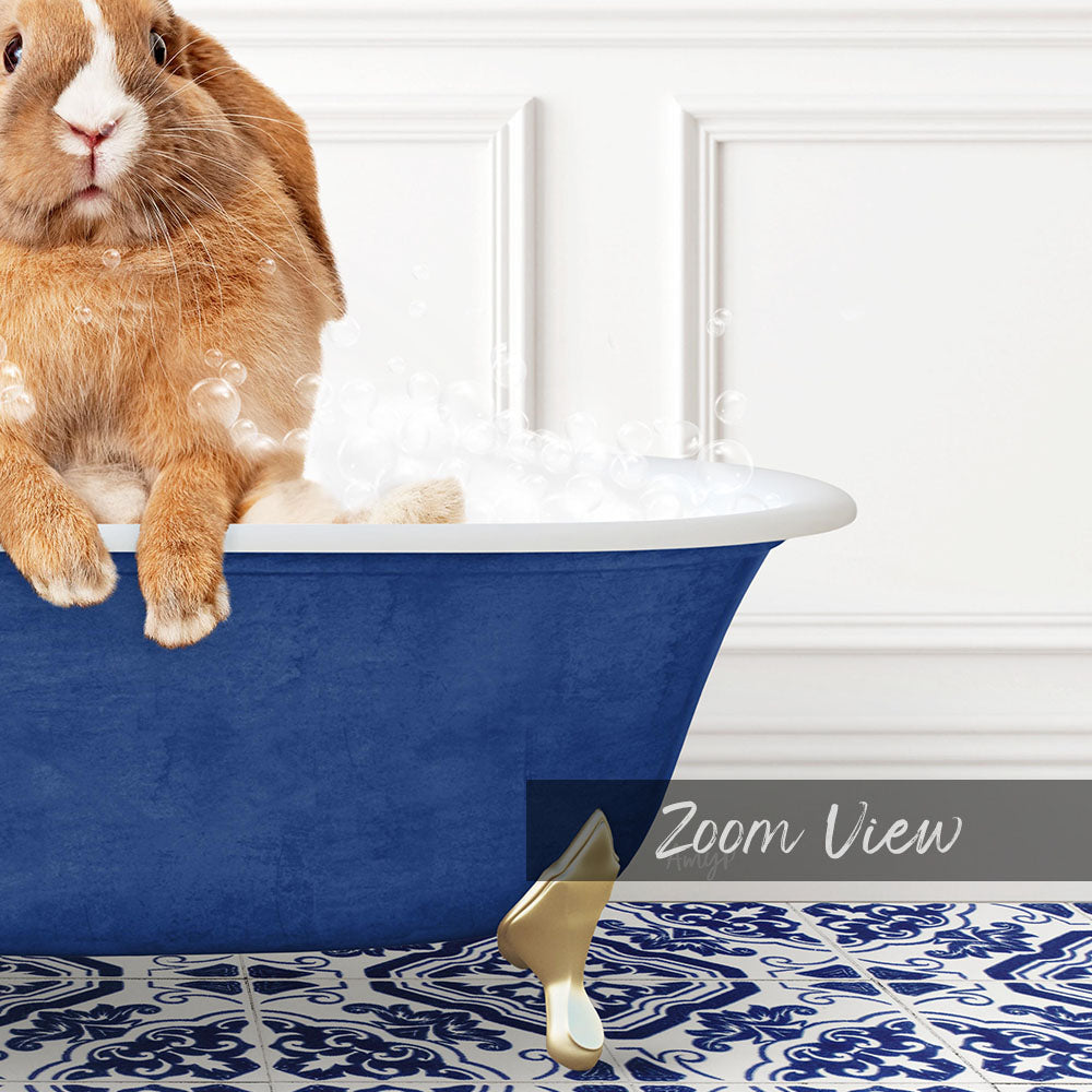 A brown rabbit sitting in a blue bathtub filled with bubbles, with a white wall and patterned floor in the background.