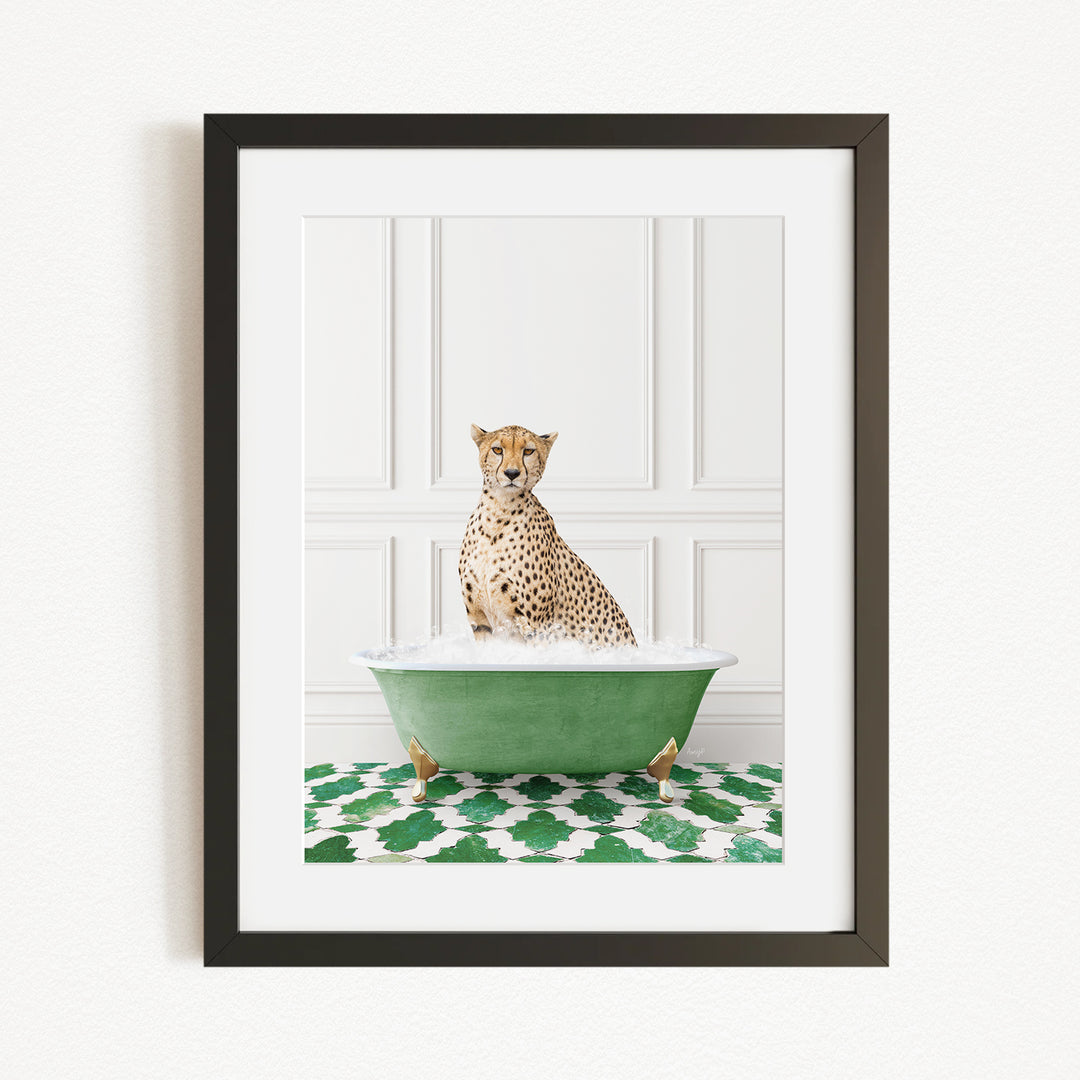 A cheetah sitting in a green bathtub filled with water, surrounded by a green and white patterned rug.