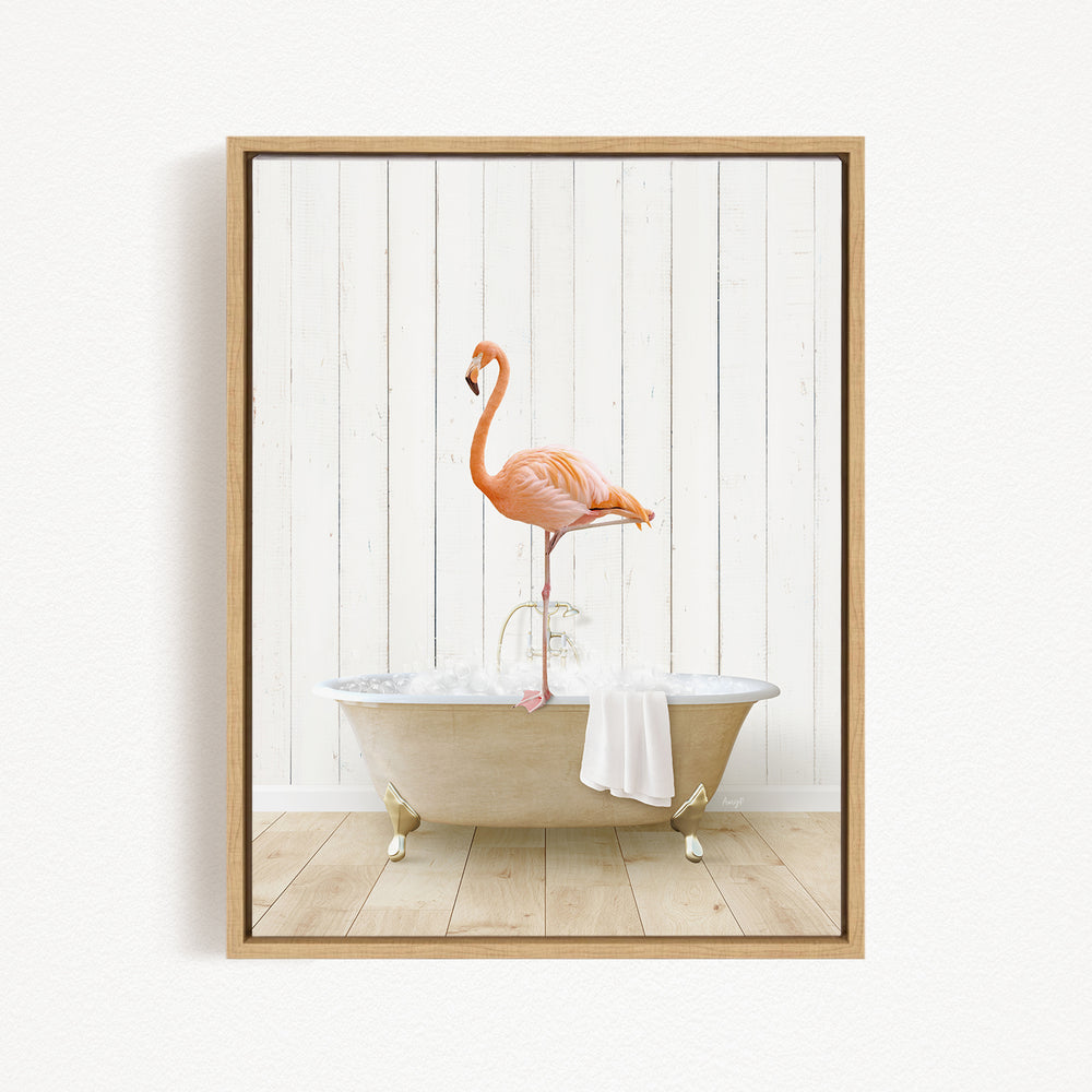 A framed image of a pink flamingo standing on the edge of a bathtub filled with water.