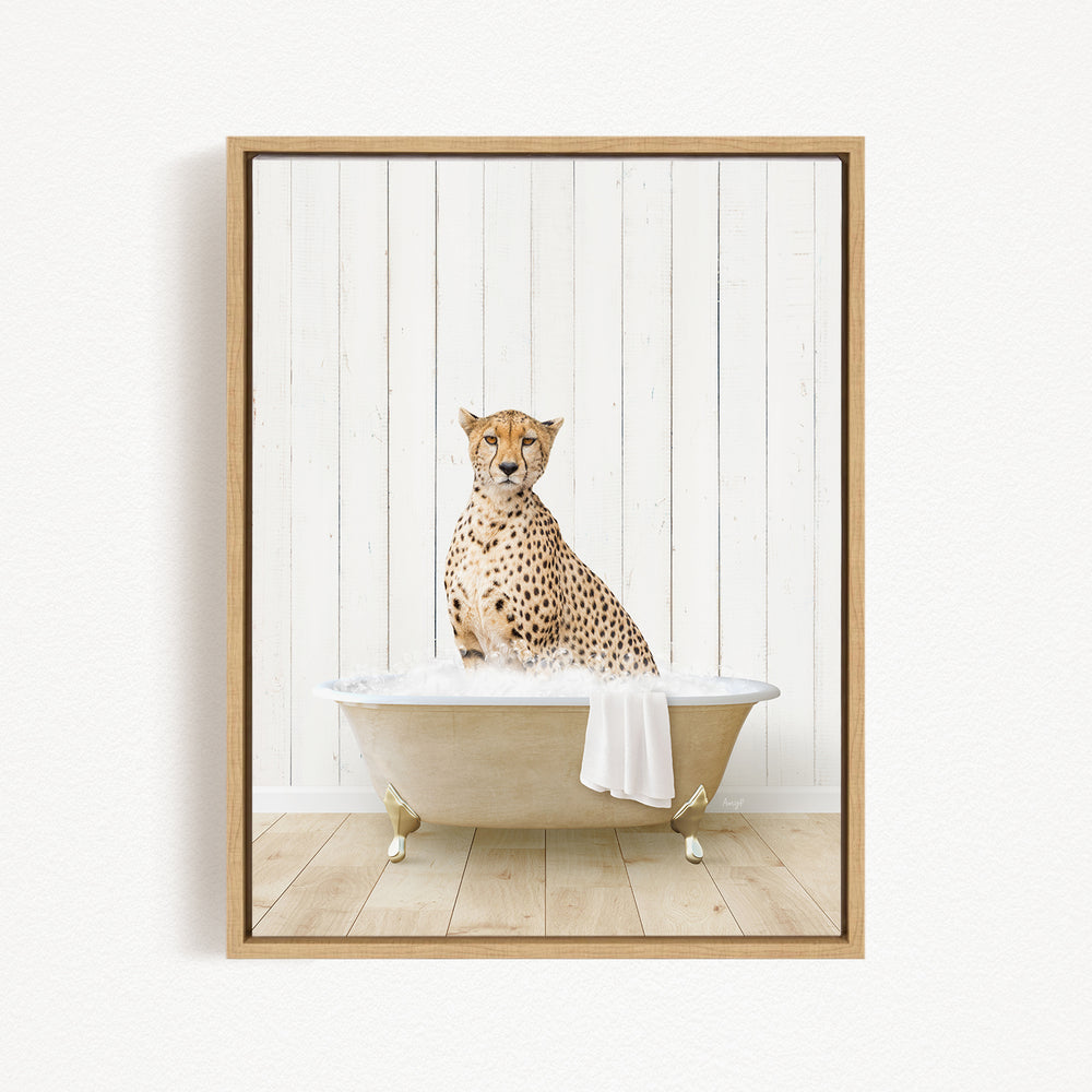 A cheetah sitting in a bathtub filled with water, with a towel draped over the side of the tub.
