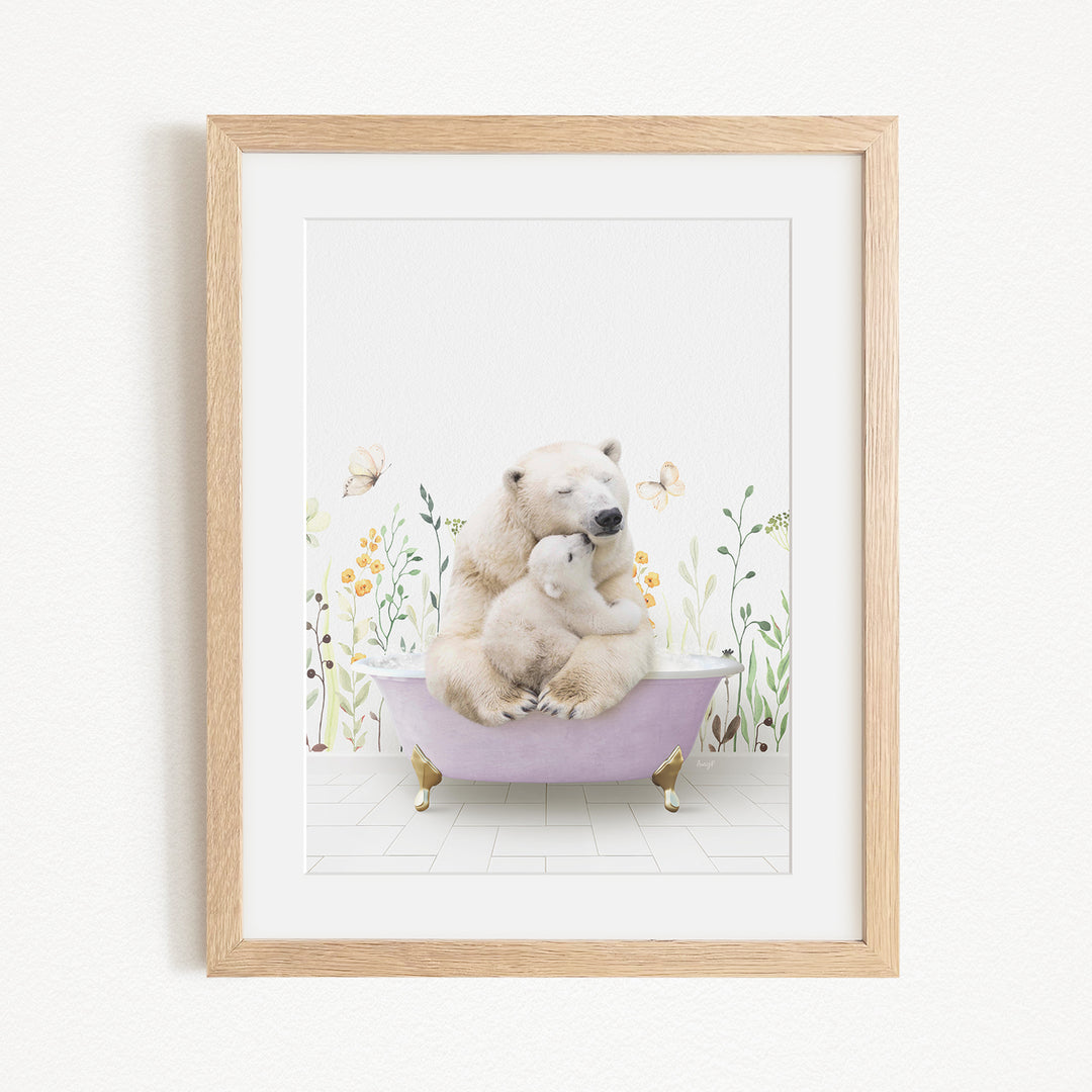 A framed image depicting a mother polar bear sitting in a bathtub, with her cub resting on her lap, surrounded by flowers and butterflies.