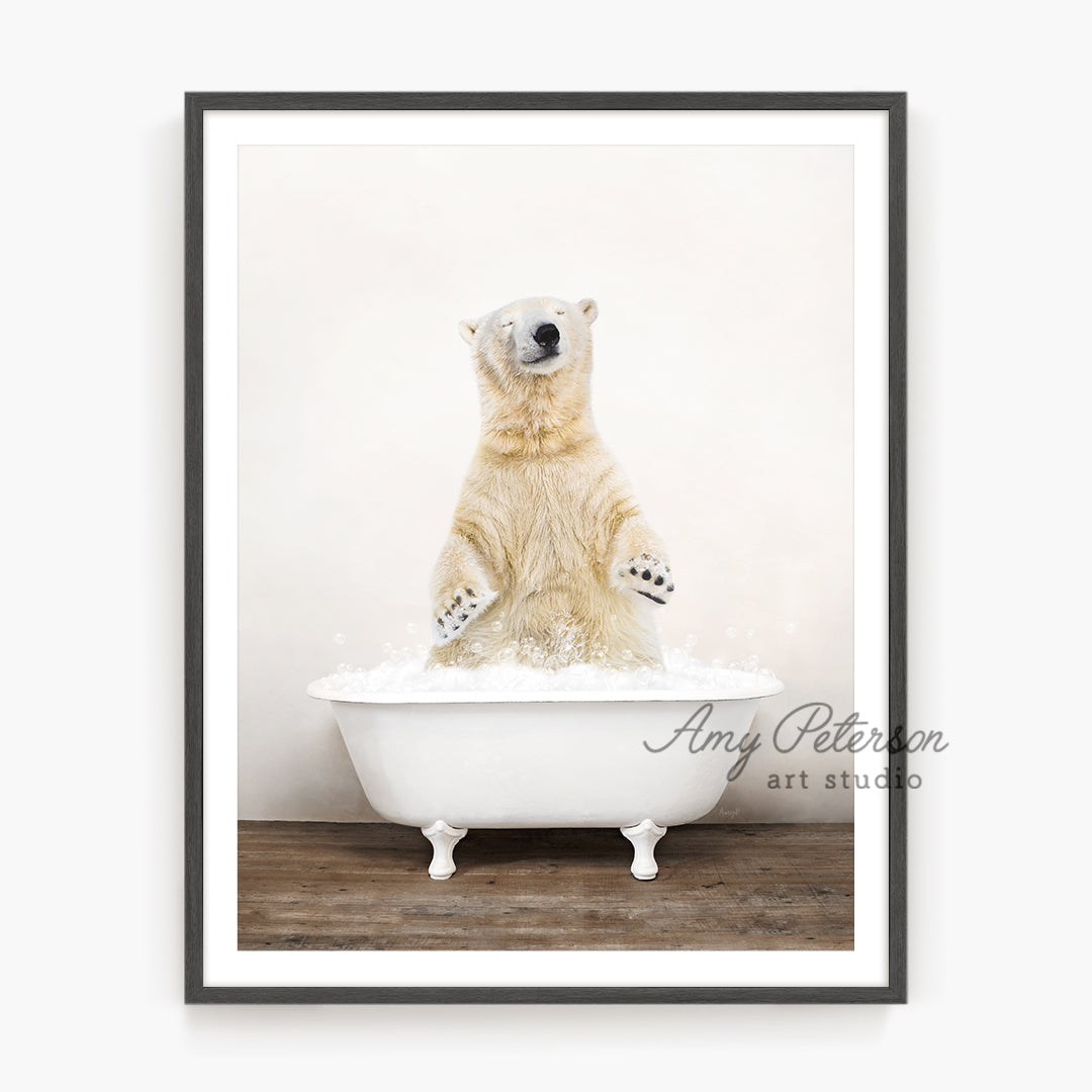 a polar bear sitting in a bath tub