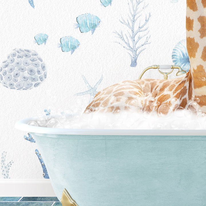 a giraffe laying in a bathtub filled with foam