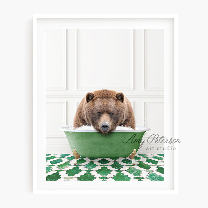 a brown bear sitting in a green bowl