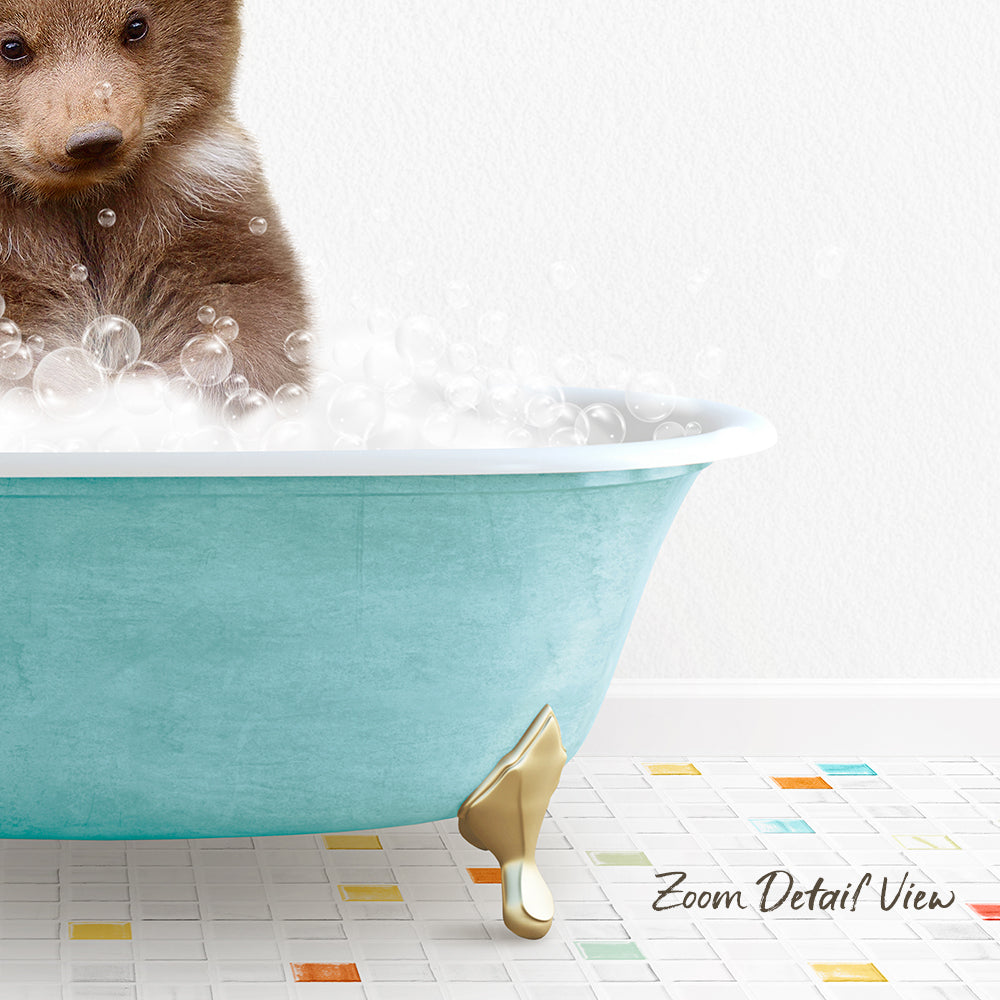 A small brown bear is sitting in a blue bathtub filled with bubbles, creating a whimsical and playful scene.