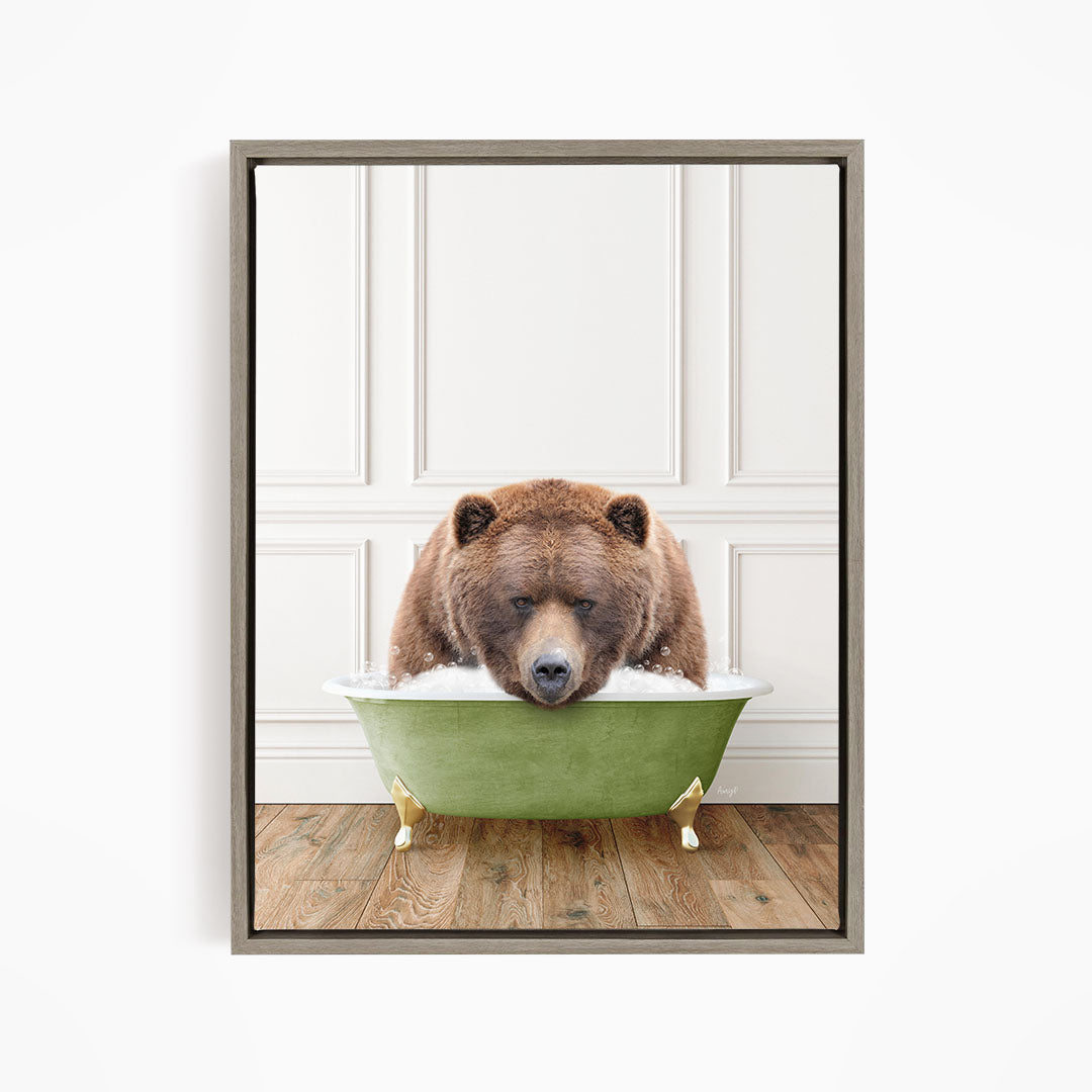 A brown bear is sitting in a green bathtub, appearing to be enjoying a relaxing bath.