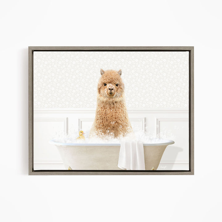 A fluffy brown alpaca sitting in a white bathtub filled with bubbles, with a yellow rubber duck floating nearby.