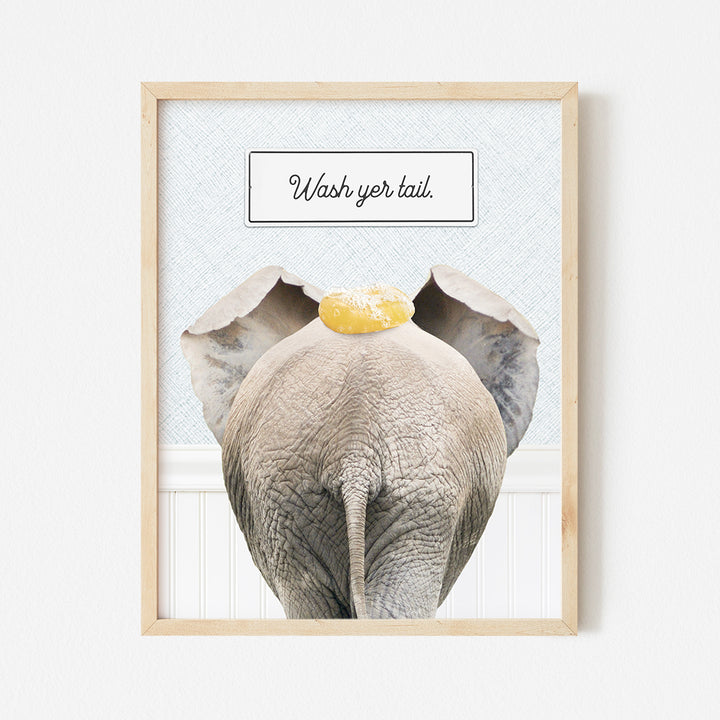 a picture of an elephant with a yellow hat on its head