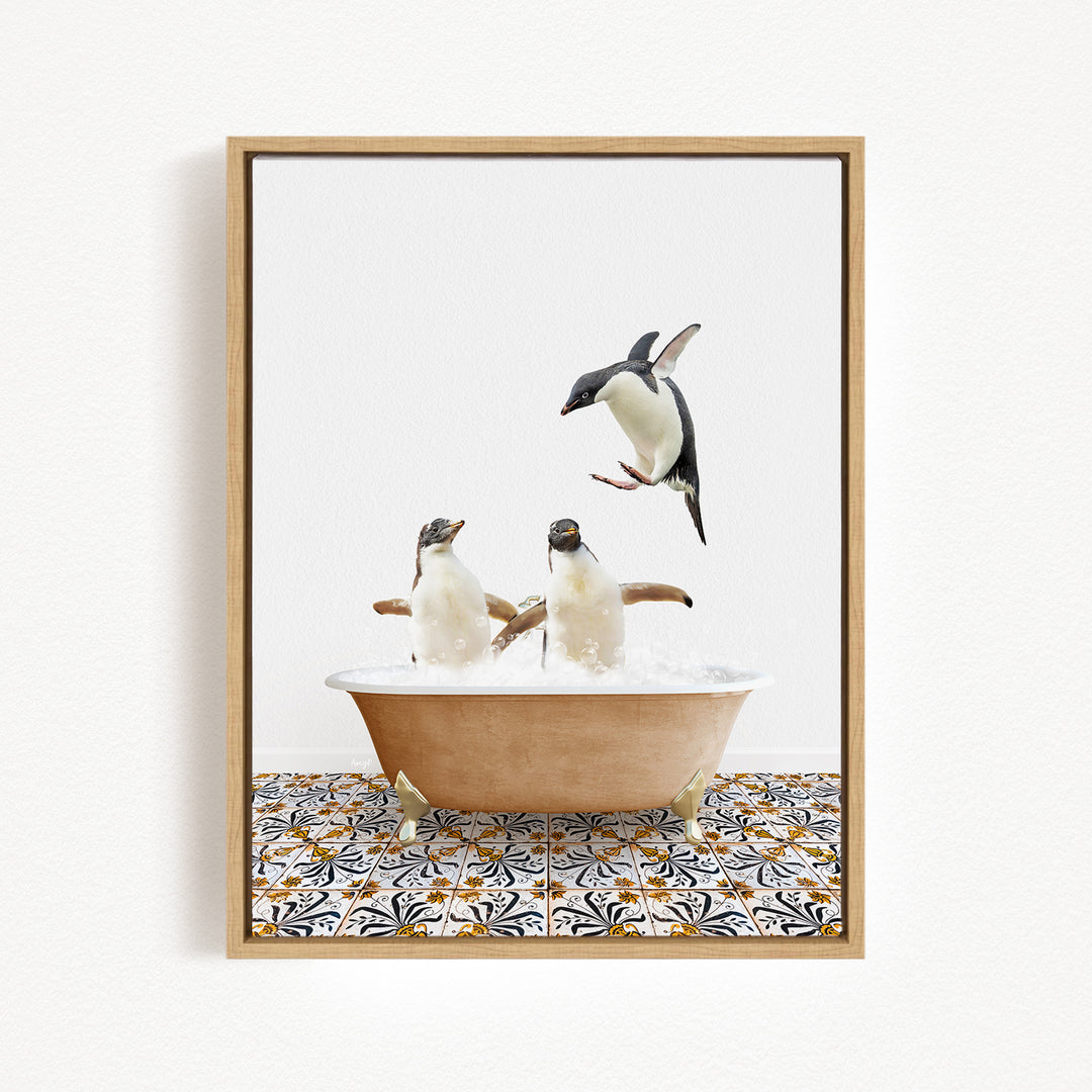 A framed image depicting two penguins sitting in a bathtub filled with bubbles, with one penguin flying out of the tub.