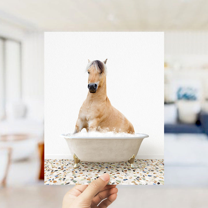 A horse sitting in a bathtub filled with water, surrounded by a mosaic floor.