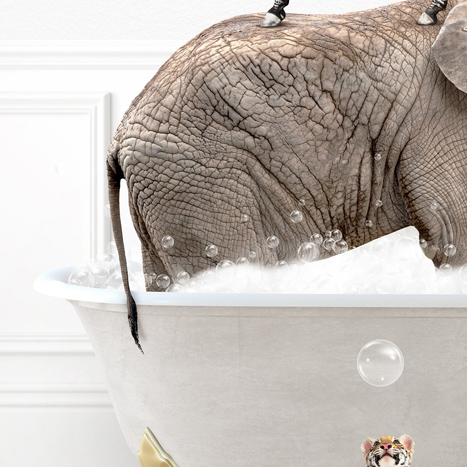 an elephant is taking a bath in a bathtub