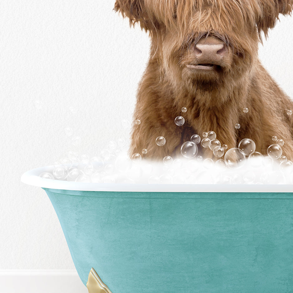 a brown dog sitting in a bath tub filled with bubbles