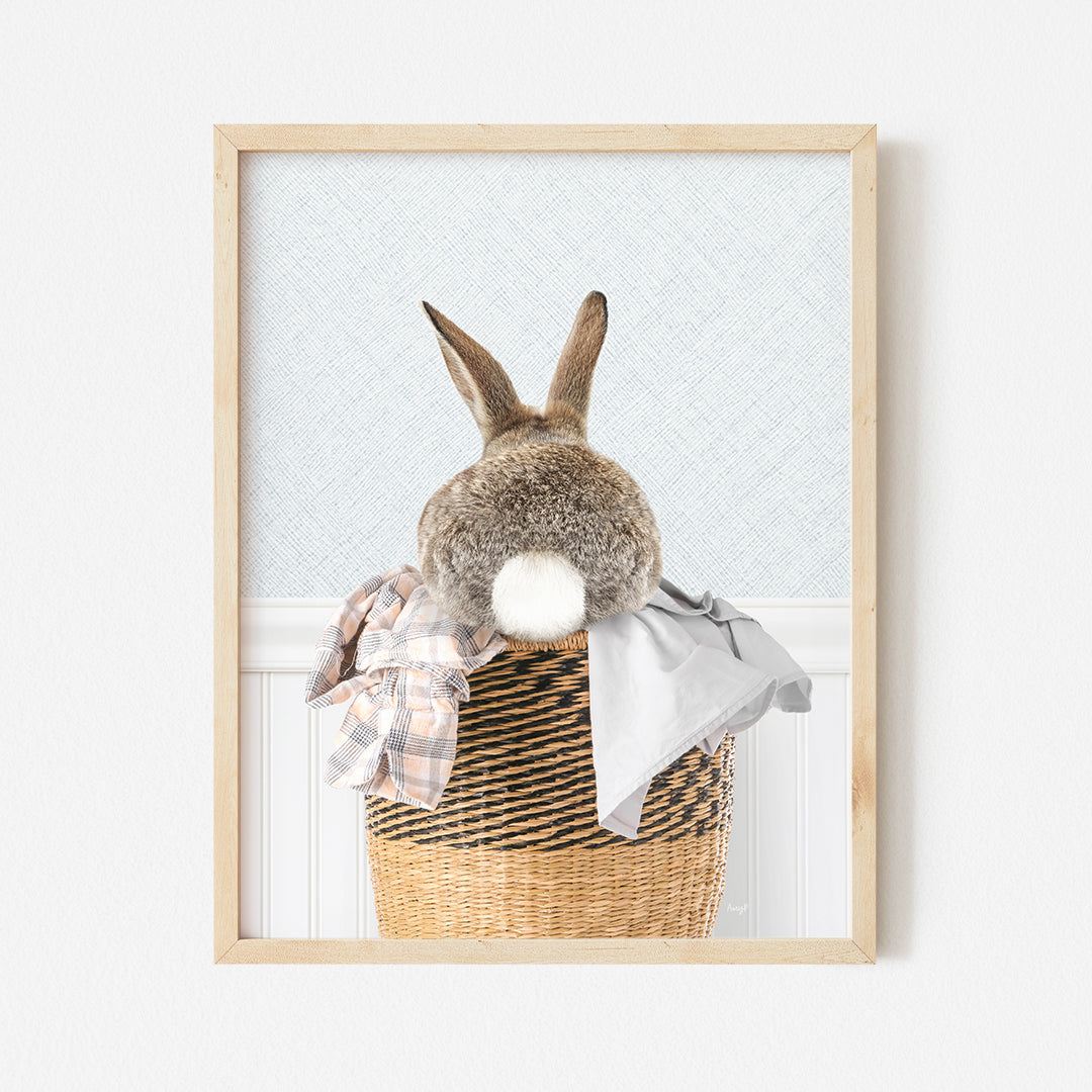 a picture of a stuffed rabbit in a basket