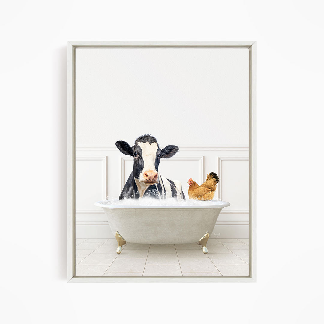 A black and white cow is sitting in a white bathtub, with a chicken standing on its hind legs and pecking at the cow's back.