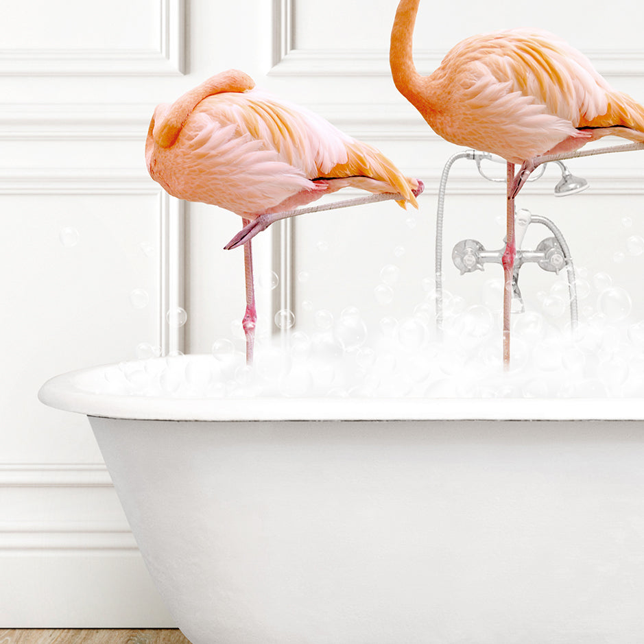 two flamingos standing in a bathtub with bubbles