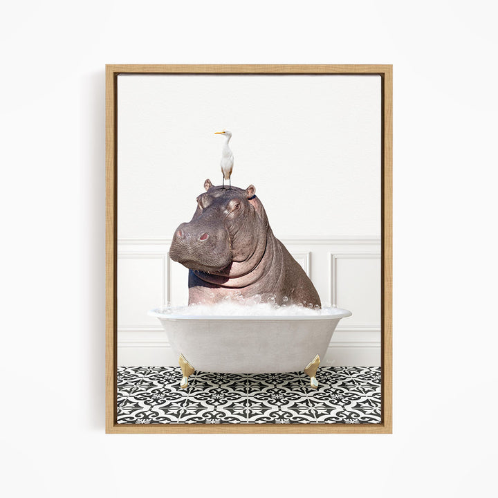 A framed image depicting a large hippopotamus sitting in a bathtub, with a seagull perched on its head.
