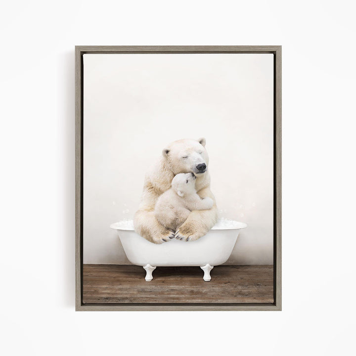 A mother polar bear and her cub sitting together in a white bathtub, with the mother appearing to be comforting her cub.