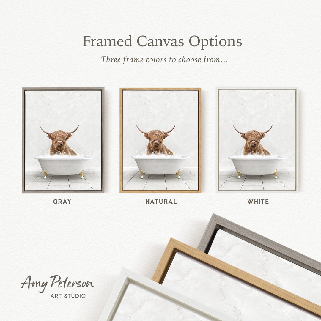 three framed canvas options, each featuring a brown cow sitting in a bathtub. The options include a gray, a natural, and a white frame.