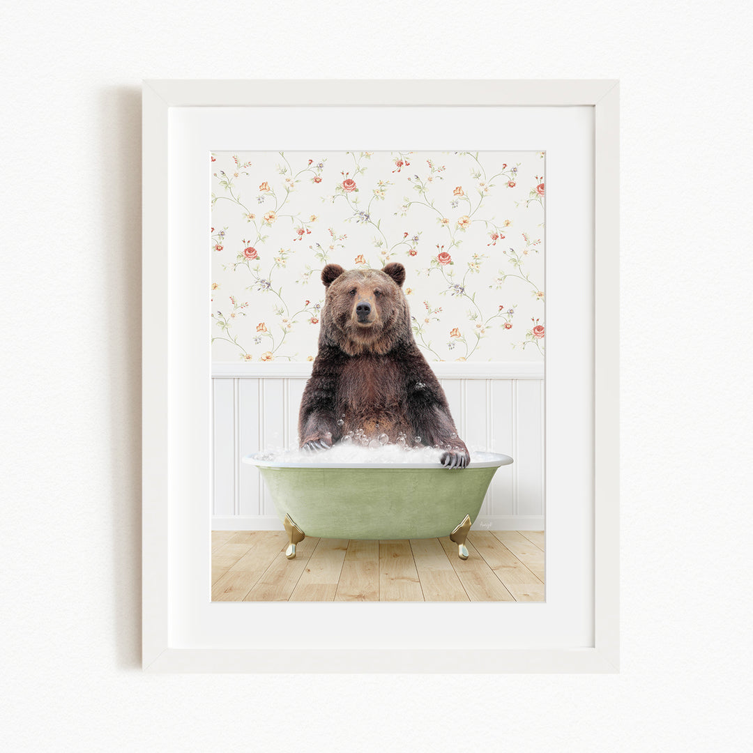 A brown bear sitting in a green bathtub, surrounded by a floral wallpaper.