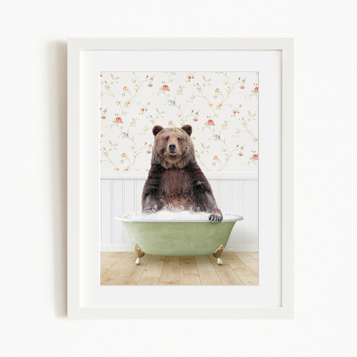 A brown bear sitting in a green bathtub, surrounded by a floral wallpaper.