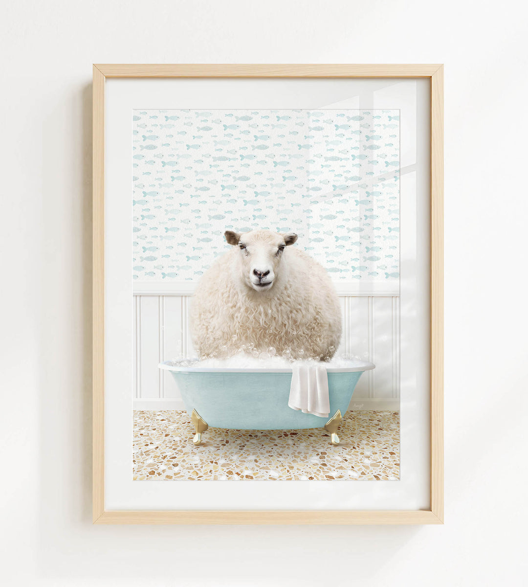 A fluffy white sheep sits in a blue bathtub filled with bubbles, surrounded by a patterned wall and a tiled floor.