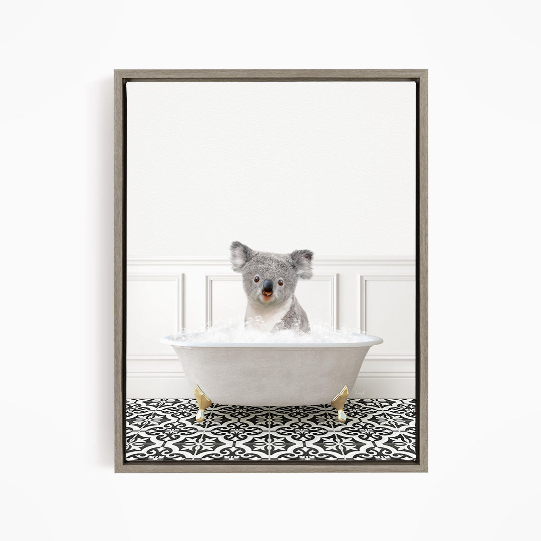 A koala bear sitting in a bathtub filled with water, surrounded by a black and white patterned floor.