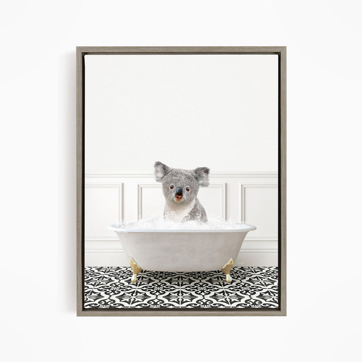 A koala bear sitting in a bathtub filled with water, surrounded by a black and white patterned floor.