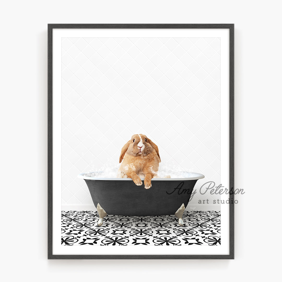 a dog sitting in a bathtub with a black frame