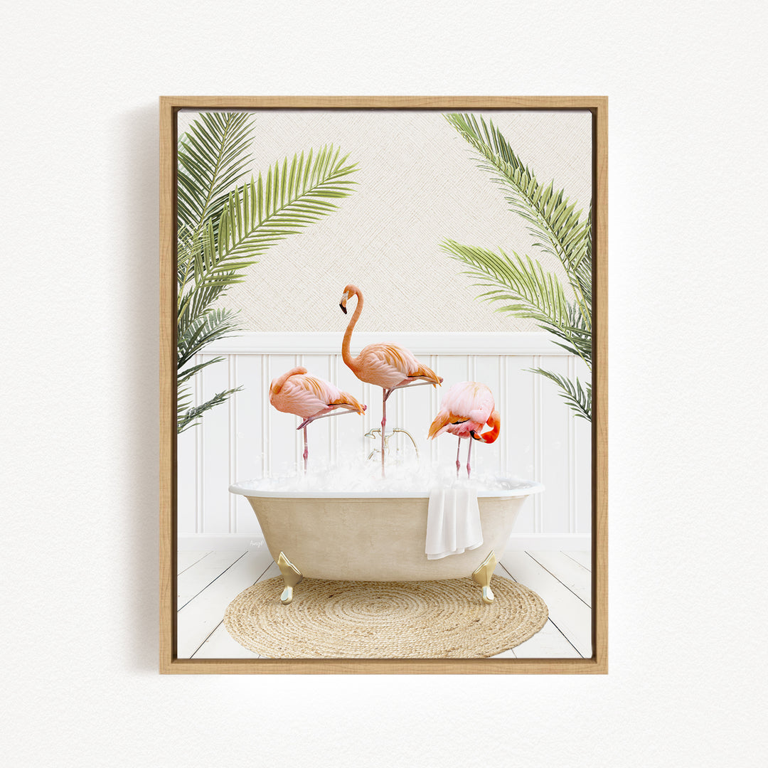 A framed image depicting three flamingos standing in a bathtub filled with water, surrounded by palm leaves.