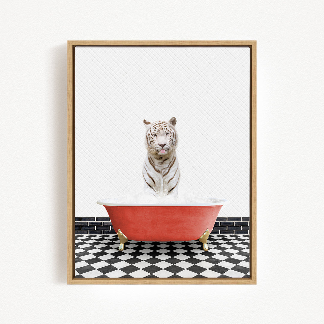 A white tiger is sitting in a red bathtub, surrounded by a black and white checkered floor.
