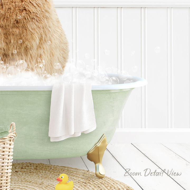 A fluffy brown cat is sitting in a green bathtub filled with bubbles, surrounded by a white towel, a yellow rubber duck, and a basket.