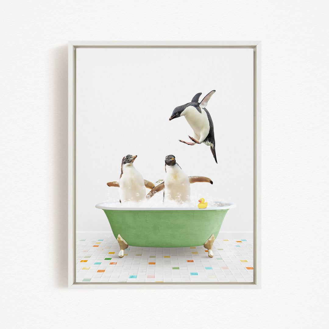 A framed image depicting two penguins sitting in a green bathtub, with one penguin standing on its hind legs and another penguin sitting in the tub.