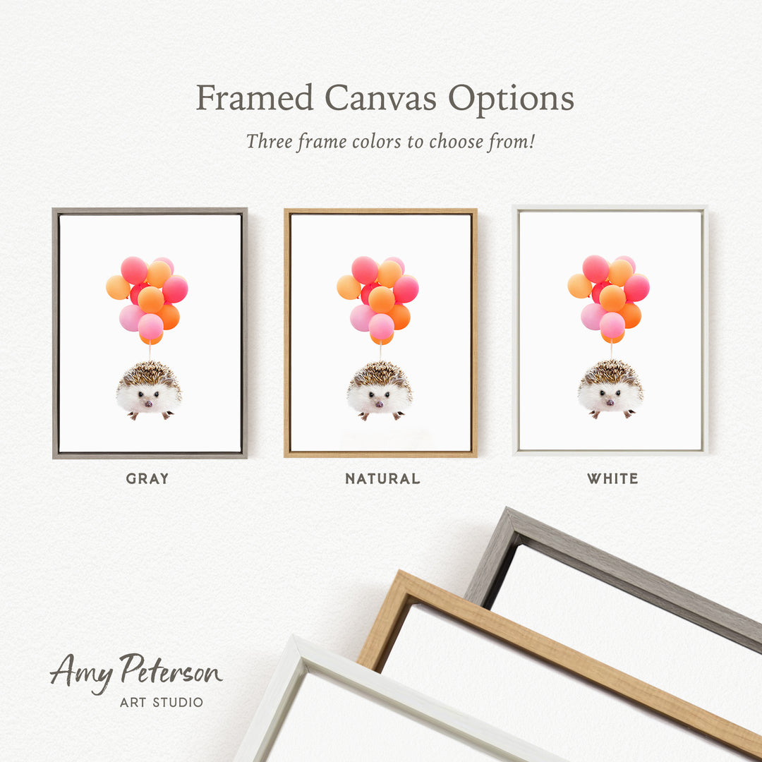 three framed canvas options, each featuring a hedgehog holding colorful balloons. The options include a gray frame, a natural frame, and a white frame.