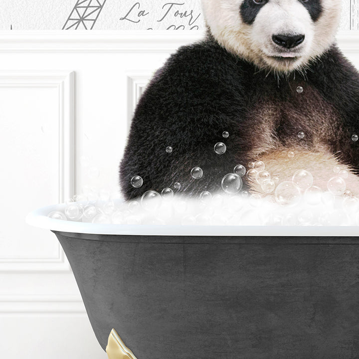 a panda bear sitting in a bathtub full of bubbles