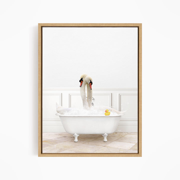 A white swan is sitting in a white bathtub, surrounded by bubbles, with a rubber duck floating nearby.