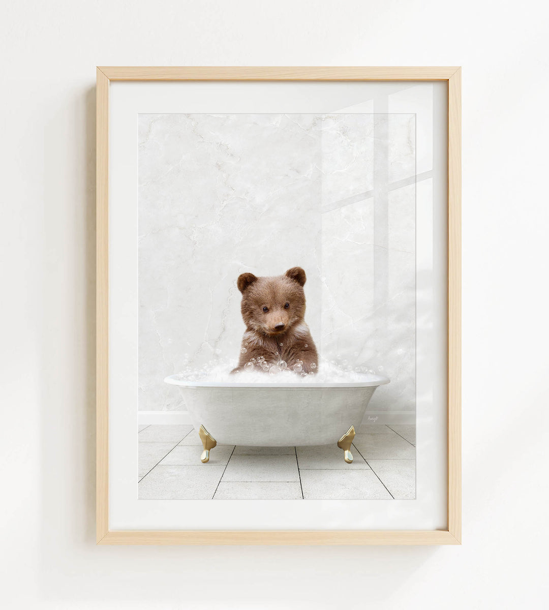 A brown bear sitting in a white bathtub filled with bubbles, creating a whimsical and playful scene.